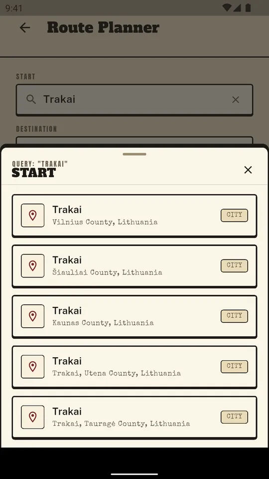 Address search: the typed text and the suggestions sheet under it.